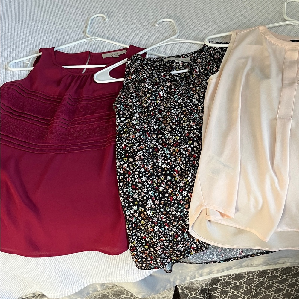 Three Sleeveless Blouses